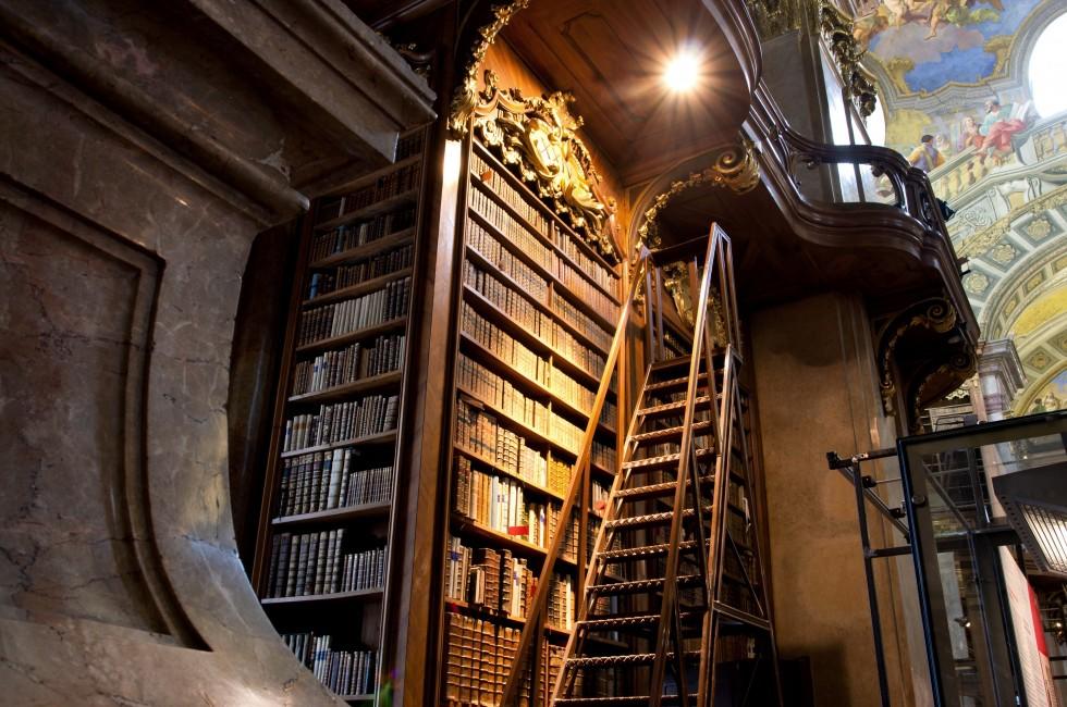 VIENNA, AUSTRIA - MAY 30: Stairs near the tall bookcase inside the great Austrian National Library on May 30, 2013 in Vienna. Est in 18th century, the largest library in Austria with 7.4 mill items; 