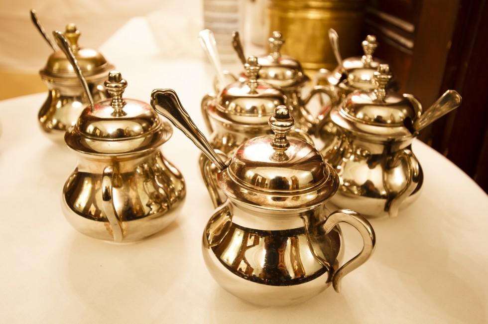 Metal sugar containers in traditional Viennese coffee house, Demel, Vienna, Austria; 