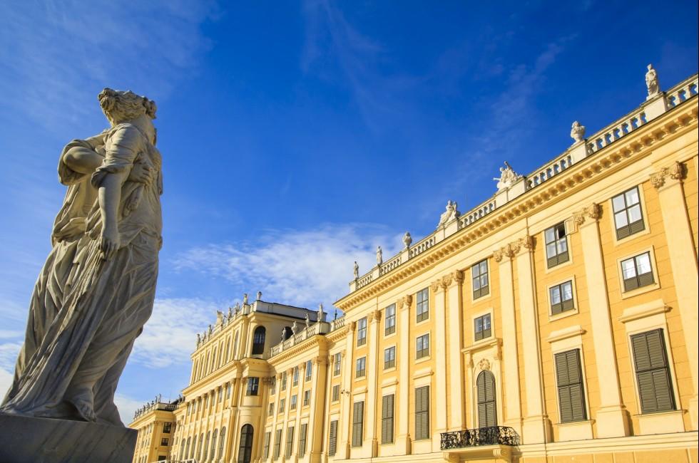 Vienna - Greek statue with the Schonbrunn palace on the background.