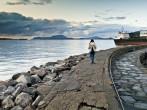 Girl having a walk in the docks of Alesund